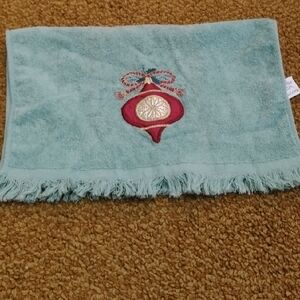 Embroidered Teal Towel with Ornament Design